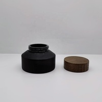 Pot cosmétique de haute qualité 100g en verre noir mat à épaule inclinée avec couvercle en bambou pour crème