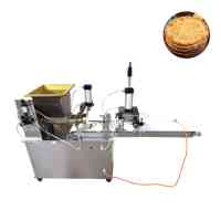 Machine de découpe d'extrudeuse de bâtonnets de pain Salt Fortune Machines à biscuits froissés marocaines Machine à base de pizza