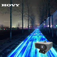Projection LED interactive multicolore pour sol, portable et légère, idéale pour les événements en plein air et les aires de jeux pour enfants.