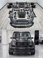 Kit carrosserie aérodynamique complet en fibre de carbone pour Mercedes G63 W464 SUV tout-terrain, comprenant des ailes larges, un capot BRABUS et un diffuseur arrière.