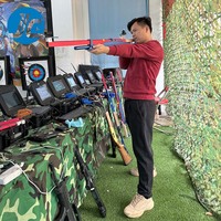 Nouveau centre de divertissement pour enfants Arcade Shooting Gun Game Machine Machine de jeu à jetons à vendre