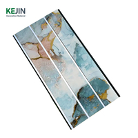 Panneau de plafond décoratif suspendu en PVC à languette et rainure Plafond à texture de marbre en plastique multiple
