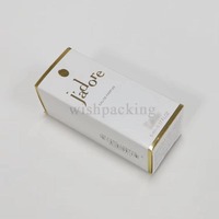 Boîte d'emballage en papier de luxe en carton blanc personnalisé avec insert coloré pour bouteille de parfum en verre