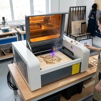 Nouvelle machine de gravure et de découpe au laser CO2 40W 4040 refroidie par eau pour bois, MDF, verre, acrylique, tissu, non-métaux