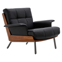 Fauteuil lounge en cuir avec structure en bois et pieds en métal, siège rembourré, personnalisable OEM pour hôtel et bureau