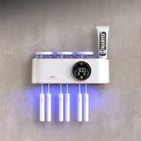 Großhandel Intelligenter UV-Zahnbürsten-Sterilisator Wandmontiert USB-Aufladung Trocknender Elektrischer Zahnbürsten-Sterilisator