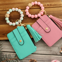 Dompet wanita kulit gelang manik-manik silikon kustom modis dengan tempat kartu ritsleting dompet koin gantungan kunci