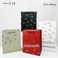 Vente en gros de sacs-cadeaux en papier cartonné blanc pour supermarchés internationaux et chaînes de vente au détail Sacs-cadeaux en papier carté blanc de qualité supérieure