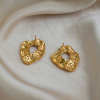 Boucles d'oreilles clous X&L en acier inoxydable étanche plaqué or 18 carats, motif cercle creux, bijoux de charme populaires pour femmes, mode quotidienne