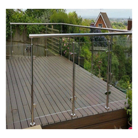 Poteau rond en acier inoxydable pour garde-corps en verre, design robuste avec base à bride et support de serrage pour verre