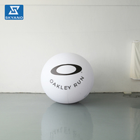 Ballon publicitaire gonflable en PVC blanc personnalisé pour la promotion de la marque lors d'événements en plein air, décoration paysagère