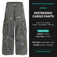 Pantalon cargo évasé vintage effet vieilli, coupe ample à jambe empilée, couture incurvée, style streetwear, taille mi-haute, personnalisable OEM, faible MOQ