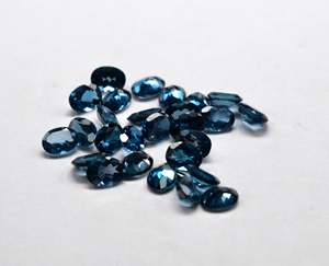 Prix d'usine en gros de haute qualité 7X9mm taille ovale topaze bleue de Londres naturelle certifiée IGCI pierre précieuse à facettes en vrac par carat - Product Image 2