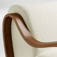 Fauteuil design minimaliste de style moderne, de forme unique, pour salons, balcons et usage domestique