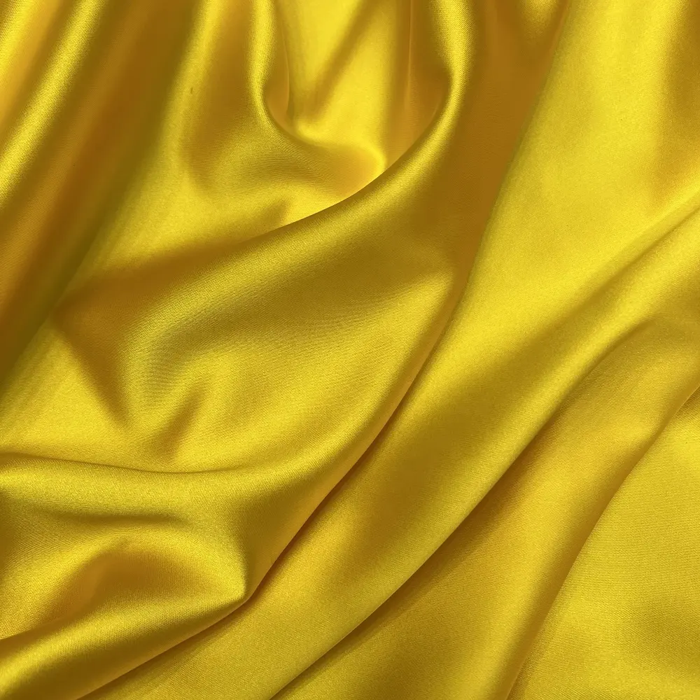 Bright shiny duchess satin fabric well draped valentino satin fabric