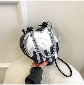 Grosir tas tangan wanita tas kulit PU unik tas tangan wanita mewah bentuk hati tali rantai untuk pesta