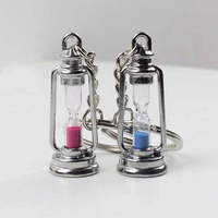 Nouveau mignon métal lampe forme minuterie sablier chaîne lanterne porte-clés Couple porte-clés nouveauté article femmes hommes meilleur cadeau