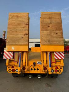 Ventas calientes Semirremolque amarillo de cama baja con <span class=keywords><strong>rampa</strong></span> para transporte de equipos pesados - Product Image 6