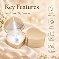 Boîte à bijoux lumineuse en forme de cœur, intérieur en velours, éclairage LED automatique, coque en plastique, pour cadeau de fiançailles ou d'anniversaire