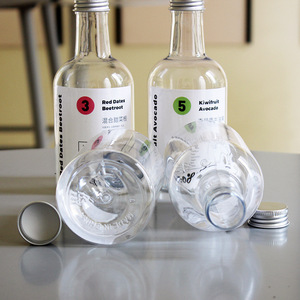 Bouteille de boisson jetable personnalisée en plastique <span class=keywords><strong>PET</strong></span> avec long col forme ronde et joint pour jus de fruits frais thé au lait - Product Image 4