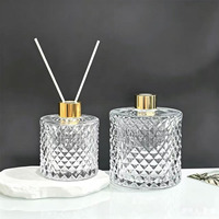 Diffuseur de parfum en verre cylindrique de luxe 50ml/100ml/200ml avec bâtonnets, rechargeable, couleur et emballage personnalisables