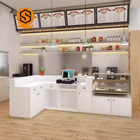 Comptoir de bar en forme de L de qualité commerciale, comptoir de réception haut de gamme, comptoir de bar commercial personnalisé pour les magasins de bubble tea, de café et de desserts