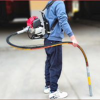 Tragbarer Viertakt-Außenmotor-Rucksack-Betonrüttler mit 220V 50Hz Vibrationsstab und Zementschlamm