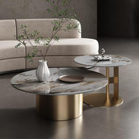 Table basse de salon moderne de luxe léger, design créatif, plateau en marbre, simple, ronde, en acier inoxydable doré