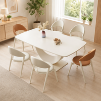 Ensemble de table à manger ronde en acier moderne de luxe avec 6 chaises pour la maison