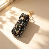 Pochette de rangement vintage de luxe en tweed pour rouge à lèvres, avec empiècements en cuir, breloque de sac porte-clés, décor transfrontalier pour cadeau promotionnel