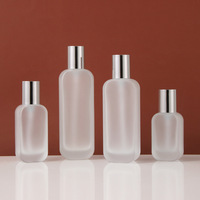 Ensemble de flacons et pots cosmétiques en verre dépoli avec bouchons pompe argentés personnalisables pour le remplissage de crèmes, sérums et lotions pour le visage