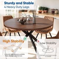 Table à manger ronde moderne en bois massif avec design imperméable et durable, pieds croisés en métal noir et pieds réglables pour la cuisine