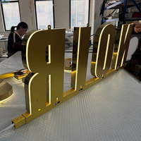 Lettres en acier inoxydable doré poli rétroéclairées avec canal pour enseignes LED haut de gamme pour entreprises de signalétique commerciale