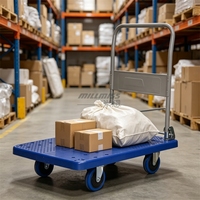 Chariot à plateforme en plastique à quatre roues pour applications industrielles en usine et entrepôt