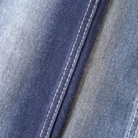 Tela vaquera elástica de alta calidad teñida en hilo, 70% algodón, 3% elastano, 11.8oz, 7S*10/40, para jeans, zapatos y bolsos, venta al por mayor