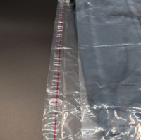 Sacs plats en LDPE pour vêtements avec trou perforé et ligne adhésive