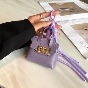 Mini llavero de cuero platino con colgante multifunción portátil para bolso, nuevo llavero para lápiz labial, auriculares y mini bolso - Product Image 3