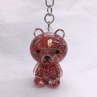 Nouveau design créatif mignon en gros porte-clés en acrylique liquide ours brun de dessin animé avec flotteur 3D OEM ODM disponible cadeau souvenir