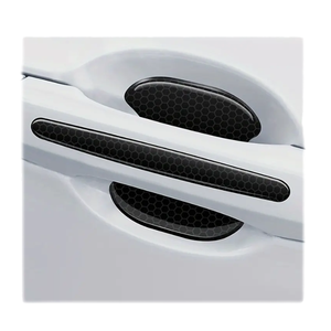 8 autocollants noirs anti-rayures pour poignées de porte, adhésifs réfléchissants pour la protection de la peinture des voitures, style tendance, garantie 1 an - Product Image 1