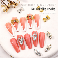 En gros YUCAGCI Breloques pour ongles en alliage 3D Nœud Papillon Ange Or Argent Strass Rétro Creux Accessoires de Nail Art Chine