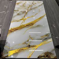 Panneau mural en marbre brillant UV 1220x2440mm 3mm, feuille de PVC imperméable et ignifuge avec veine bleue dorée pour la décoration intérieure