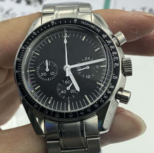 Reloj mecánico para hombre de gama alta 2025 con correa de acero plateado, esfera negra y cronógrafo de carreras con manecillas naranjas - Product Image 3