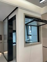 Fenêtre pliante verticale au design européen moderne en alliage d'aluminium avec verre Low-E, protection UV et insonorisation pour cuisine et design graphique