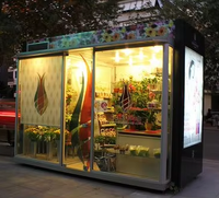 Étagère de présentation en verre de luxe avec éclairage LED, idéale pour la décoration de kiosque à fleurs, centre commercial ou magasin de détail