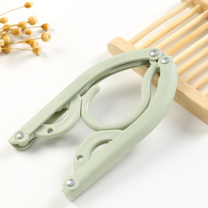 Estante de secado de ropa antideslizante, colgador de abrigos de plástico, colgador plegable para viaje, fabricación de alta calidad - Product Image 1