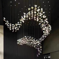 Lustre d'intérieur d'hôtel de luxe moderne avec la lampe pendante carrée de feuille en céramique personnalisable par l'usine pour des décorations de villa
