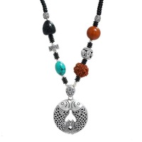 Collier Pendentif Rotatif Porte-Bonheur en Graine de Bodhi Vintage pour Femme, en Argent Tibétain et Ambre, Chaîne de Pull Réglable – Vente en Gros