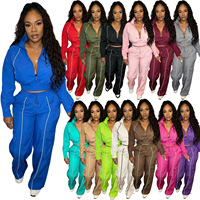 Ensemble streetwear pour femme, haut à manches longues zippé en tissu tissé coupe ample, rayures contrastées, pantalon de survêtement à jambes larges et taille élastique