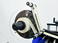 Machine d'étiquetage automatique Honemix pour flacons, ampoules, rouges à lèvres, mascara, machine d'étiquetage horizontale pour flacons ronds, machine d'étiquetage adhésive