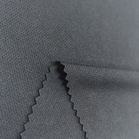 Tissu maille respirant tricoté à l'œil d'oiseau 160 GSM 100 % polyester Dri-Fit teint uni à micro-perforations pour maillot de basketball, vêtements de sport
